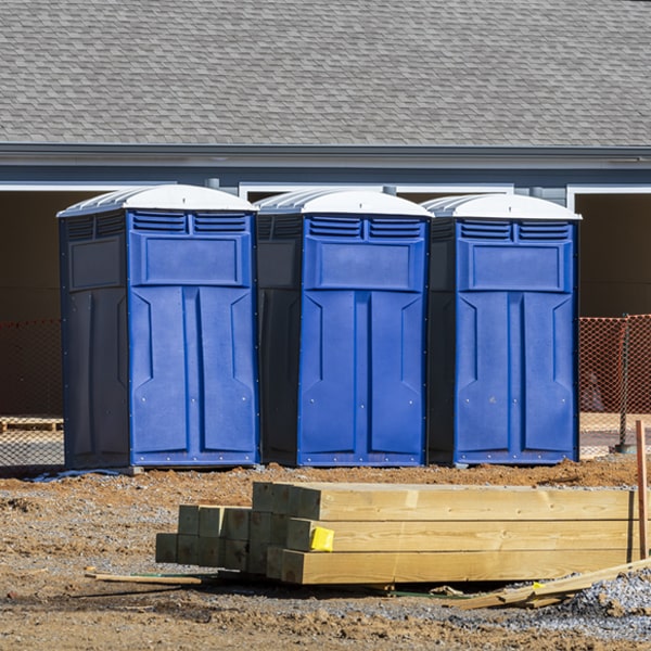 what is the cost difference between standard and deluxe portable toilet rentals in Amboy Washington